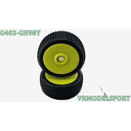 Pneus Mini spike yellow montés collés sur jantes jaunes 24mm SCHUMACHER